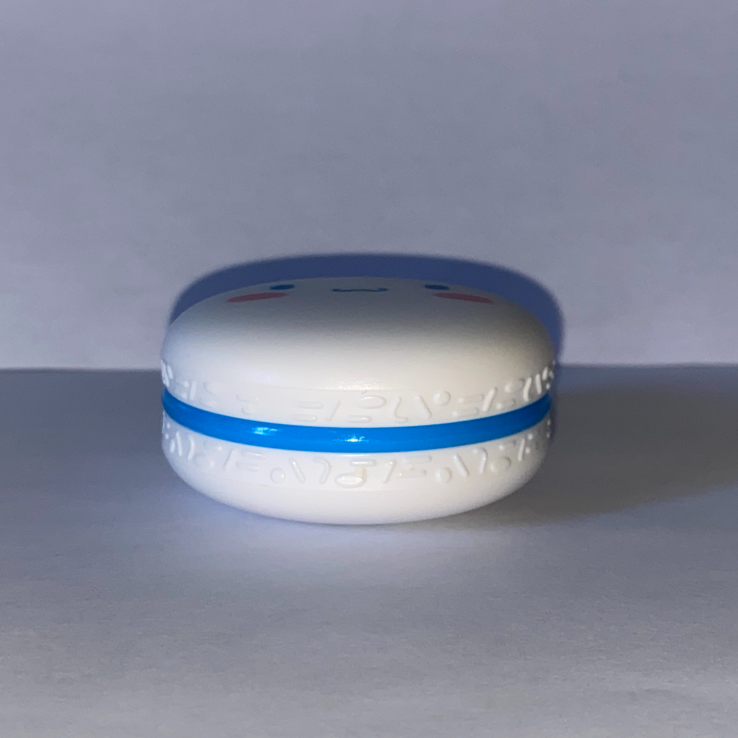 An image of a chapstick container.