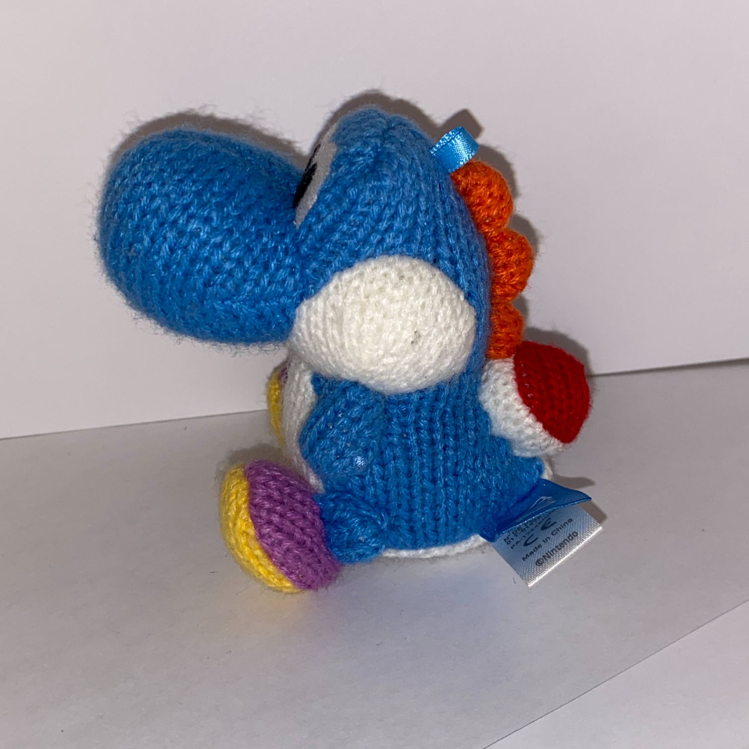 An image of a Yoshi plushie.